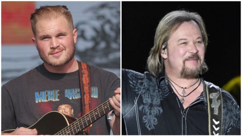 Zach Bryan, Travis Tritt meet after Bud Light disagreement. (Credit: Getty Images)