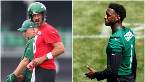 Aaron Rodgers and Sauce Gardner of the New York Jets