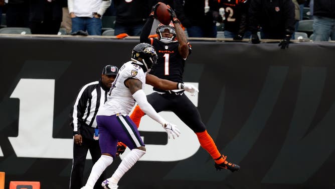 Bengals WR Ja'Marr Chase catches a touchdown pass in a Week 18 victory over the Ravens. The teams will play for the second straight week, this time in the AFC Wild Card round.