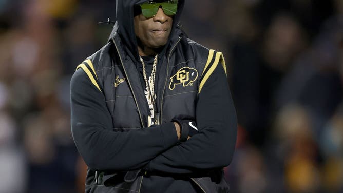 Colorado AD Rick George Shows Off His New Deion Sanders Jacket, during Friday's game against Stanford.