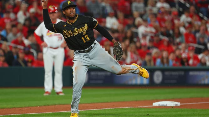 Pirates 3B Ke'Bryan Hayes throws to first base vs. the Cardinals in the 8th inning at Busch Stadium in St Louis.