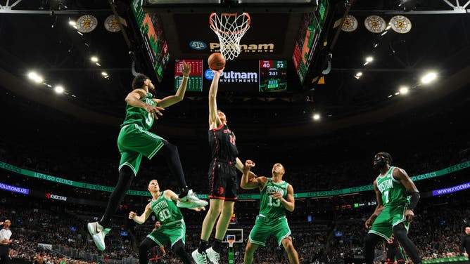 Jakob Poeltl drives to the basket during the game vs. the Celtics at the TD Garden in Boston.