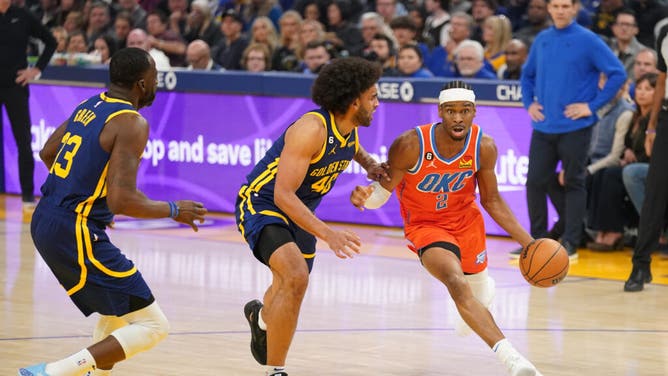 Oklahoma City Thunder PG Shai Gilgeous-Alexander drives to the basket vs. the Golden State Warriors at the Chase Center in San Francisco.