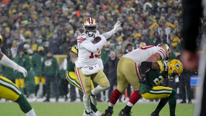 San Francisco 49ers Deebo Samuel carries the ball vs. the Packers in the 2022 NFL Divisional Round at Lambeau Field in Green Bay, Wisconsin.