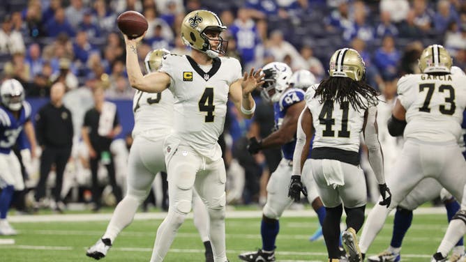 New Orleans Saints QB Derek Carr drops back to pass against the Colts at Lucas Oil Stadium in Indianapolis.