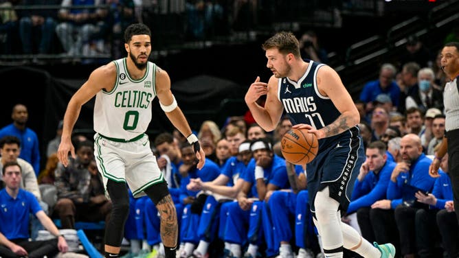 Boston Celtics SF Jayson Tatum defends Mavericks All-Star Luka Doncic at the American Airlines Center in Dallas.