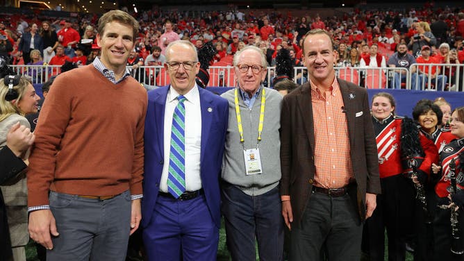 SEC Commissioner Greg Sankey, with Eli Manning, Peyton Manning and Archie Manning