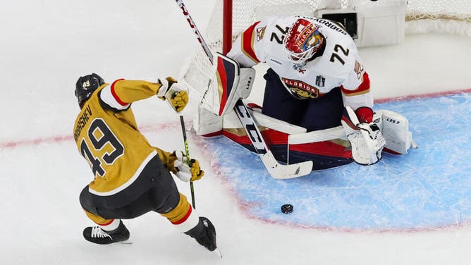Florida Panthers G Sergei Bobrovsky defends the net against Vegas Golden Knights forward Ivan Barbashev in the 3rd period of Game 1 of the 2023 NHL Stanley Cup Final at T-Mobile Arena in Las Vegas.