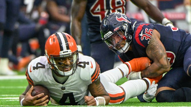 Deshaun Watson gets tackled in his Browns debut last NFL Sunday.