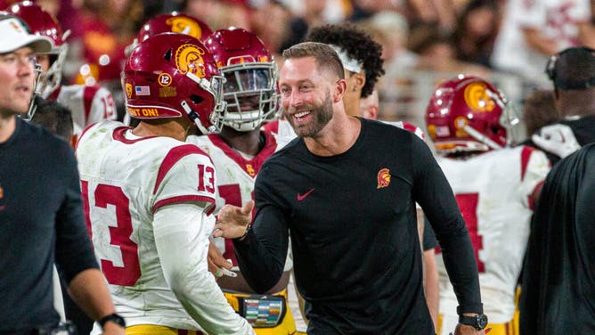 The Chicago Bears plan to interview Kliff Kingsbury for their vacant OC position, leading to speculation about Caleb Williams' future.