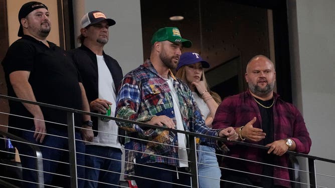 Travis Kelce of the Kansas City Chiefs attends Game One of the World Series, which Shannon Sharpe believes contributed to poor play against the Denver Broncos.