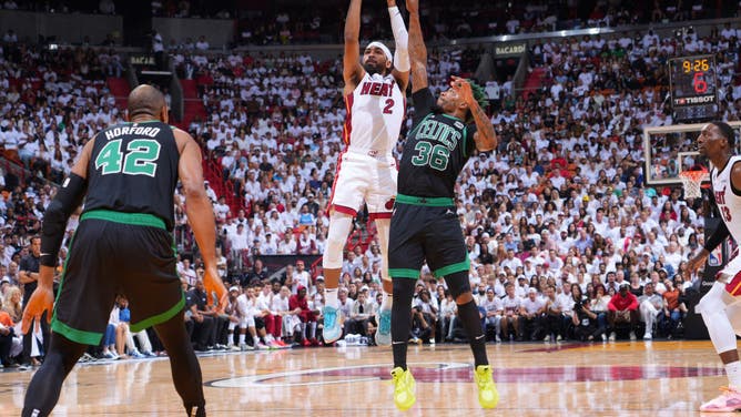 Heat PG Gabe Vincent shoots a contest shot over Boston Celtics PG Marcus Smart in Game 3 of the Eastern Conference Finals at the Kaseya Center in Miami.