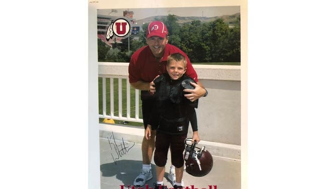 (Photo courtesy of the Wilson family) BYU quarterback Zach Wilson with current Utah football coach Kyle Whittingham at a Utah camp in 2007.