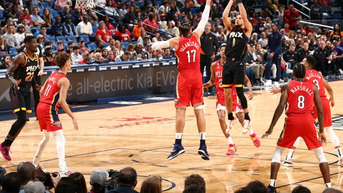 Phoenix Suns All-Star Devin Booker shoots against the New Orleans Pelicans at the Smoothie King Center in New Orleans.