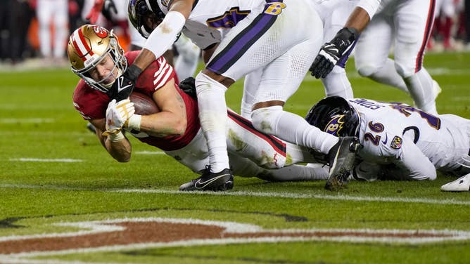 49ers RB Christian McCaffrey dives over the goal-line to score a TD vs. the Baltimore Ravens at Levi's Stadium in NFL Week 16.