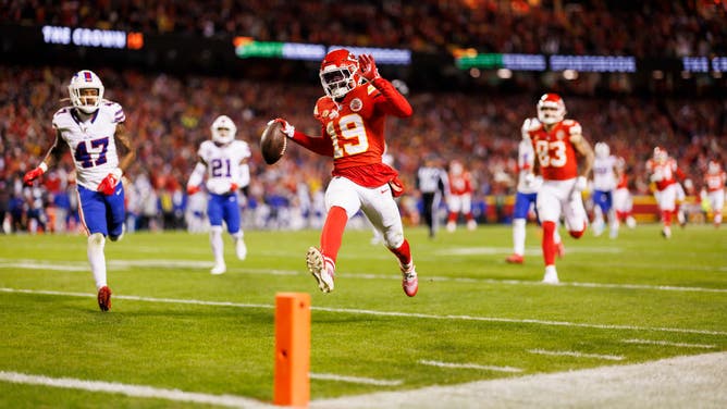 Chiefs WR Kadarius Toney runs into the end zone after catching a lateral pass from Kansas City TE Travis Kelce vs. the Buffalo Bills in Arrowhead.