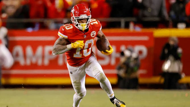 Chiefs RB Isiah Pacheco carries the ball vs. the Bengals in the AFC Championship Game at GEHA Field at Arrowhead Stadium in Kansas City, Missouri.