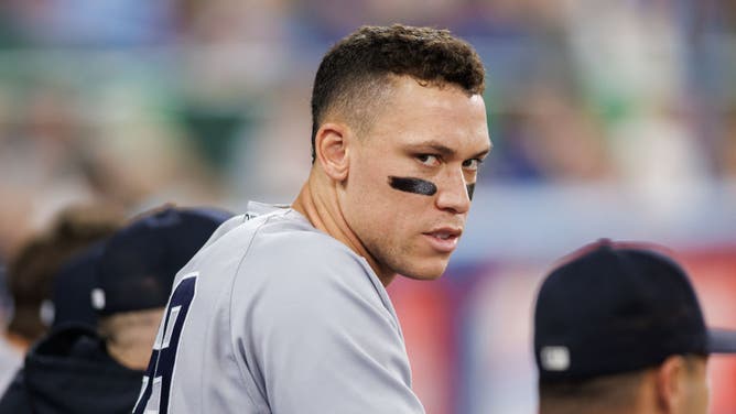 Aaron Judge of the New York Yankees in the dugout during their MLB game against the Toronto Blue Jays at Rogers Centre on May 18, 2023 in Toronto, Canada.