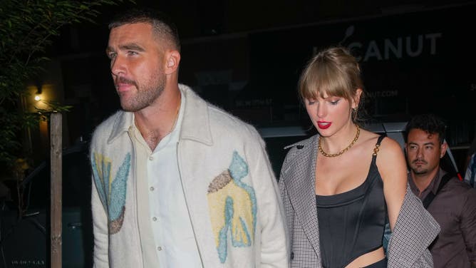 Taylor Swift Cuddles Up To Former Browns QB Bernie Kosar At Travis Kelce's House