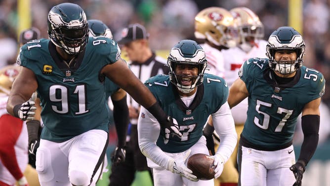 Eagles pass rusher Haason Reddick celebrates with DT Fletcher Cox and LB T.J. Edwards after recovering a fumble in the NFC Championship Game at Lincoln Financial Field in Philadelphia.