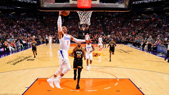 Clippers PG Russell Westbrook jams it vs. the Suns during Game 2 of their 2023 NBA Playoffs series at Footprint Center.