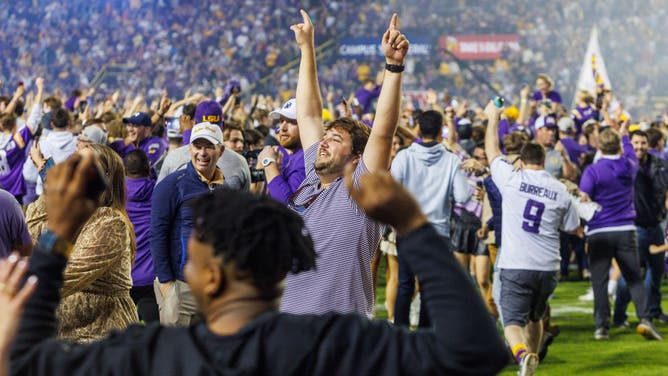 LSU Fans storm the field following the win over Alabama