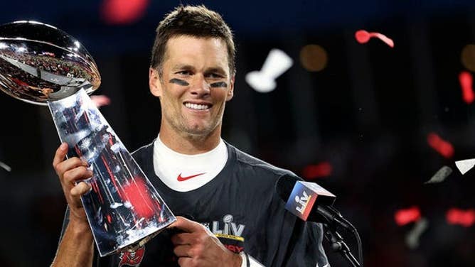 Tampa Bay Buccaneers quarterback Tom Brady holds the Vince Lombardi trophy following the Super Bowl against the Kansas City Chiefs Feb. 7, 2021, in Tampa, Fla. Tampa Bay won 31-9.