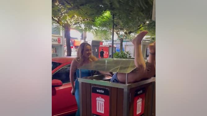 Australian Woman Gets Stuck In Trash
