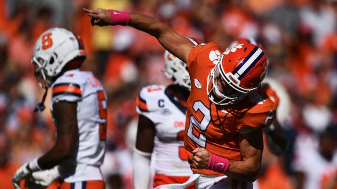 Cade Klubnik of the Clemson Tigers celebrates a touchdown against Syracuse.