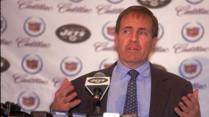 Head coach Bill Belichick of the New York Jets resigns from the job at a press conference just one day after accepting the position at Hempstead, New York, on January 4, 2000.