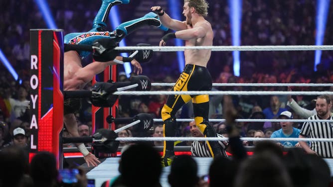 Logan Paul throws Seth Rollins over the ropes at the WWE Royal Rumble