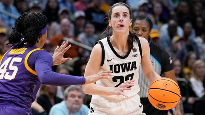 Iowa's Caitlin Clark looks to shoot past LSU's Alexis Morris during the NCAA Women's Final Four championship game, Sunday, April 2, 2023, in Dallas.
