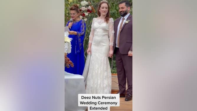 Couple Cracks Up During Wedding As Officiator Says 'Deez Nuts'