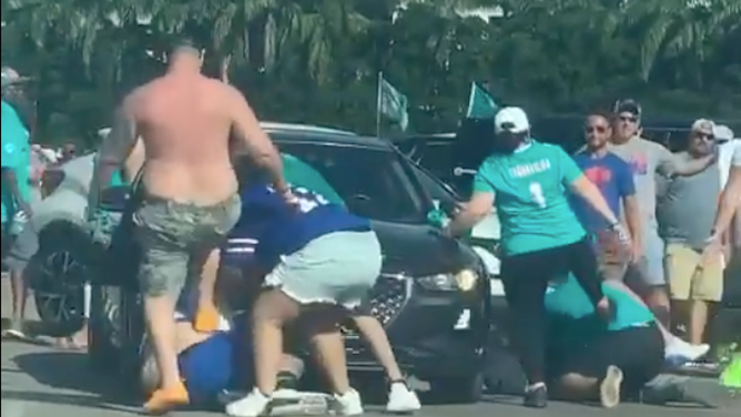 Dolphins fans beat up Bills fan parking lot fight