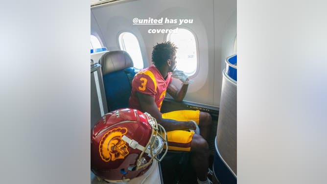 USC WR Jordan Addison Takes Picture As Part OF New NIL Deal With United Airlines