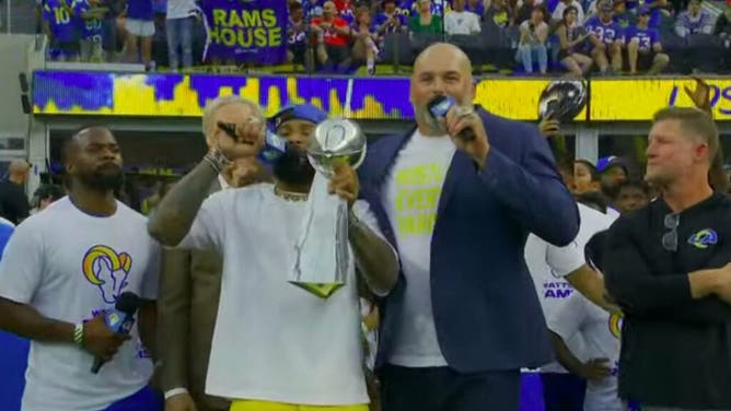 Former LA Rams Odell Beckham and Andrew Whitworth raise the Super Trophy before NFL Opening Night