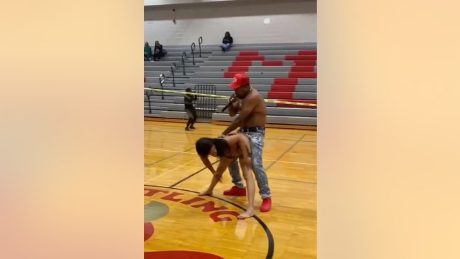Former Patriots running back bends over stripper Detroit high school gym