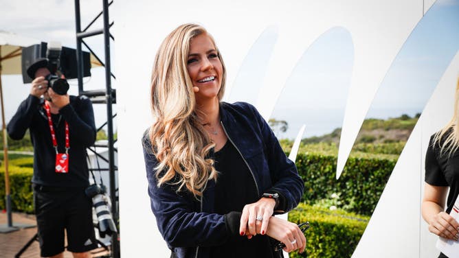 Sam Ponder of ESPN prepares to go onstage at the espnW Summit, supporting women in sports.