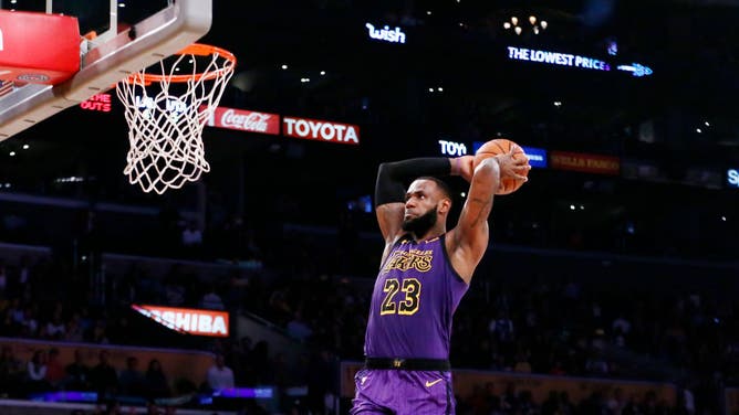 LeBron James dunks the ball against the Utah Jazz at the STAPLES Center in Los Angeles.