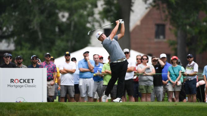 Sungjae Im hits a shot from the 9th tee during the 3rd round of the 2019 Rocket Mortgage Classic at Detroit Golf Club in Michigan.