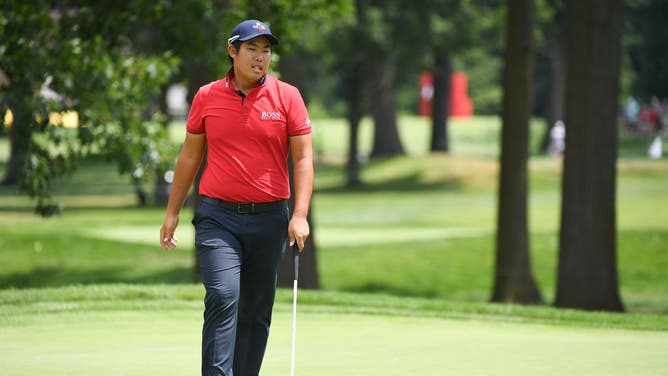 Byeong Hun An walks on the 5th green during the 3rd round of the 2019 Rocket Mortgage Classic at Detroit Golf Club.