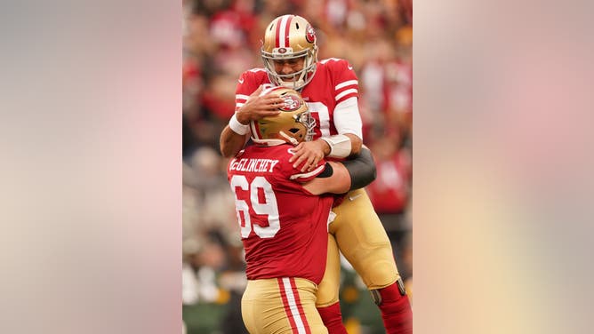 Oh, good, Mike McGlinchey knows how to pick up his quarterback. That's going to come in handy with the Denver Broncos.