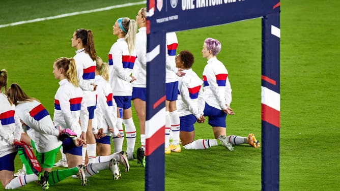 Several US Women's National Team players take a knee during the singing of the American National Anthem prior to an International friendly match between United States and Colombia.
