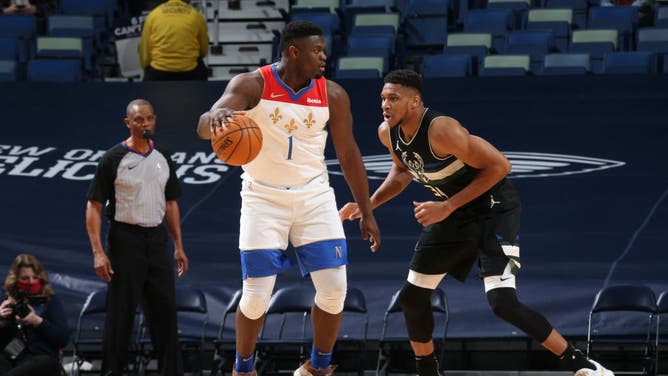 Milwaukee Bucks PF Giannis Antetokounmpo defends New Orleans PF Zion Williamson at the Smoothie King Center in New Orleans.