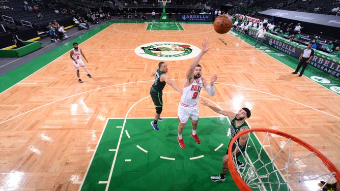 Chicago Bulls C Nikola Vucevic shoots the ball during the game against the Boston Celtics at the TD Garden in Boston.