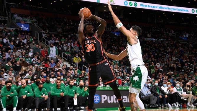 Knicks PF Julius Randle shoots a fadeaway over Celtics wing Jayson Tatum at the TD Garden in Boston.