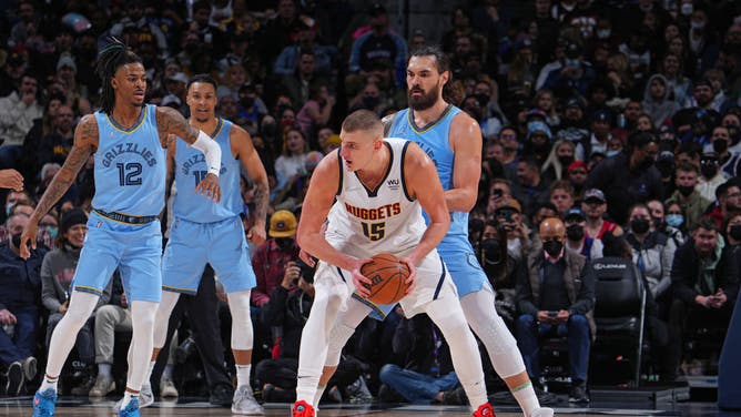 Denver Nuggets C Nikola Jokic handles the ball against the Memphis Grizzlies at the Ball Arena in Denver.