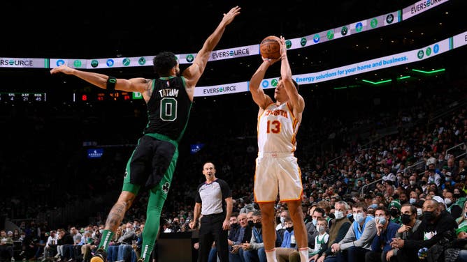 Hawks SG Bogdan Bogdanovic shooting a 3-pointer vs. the Celtics at the TD Garden.
