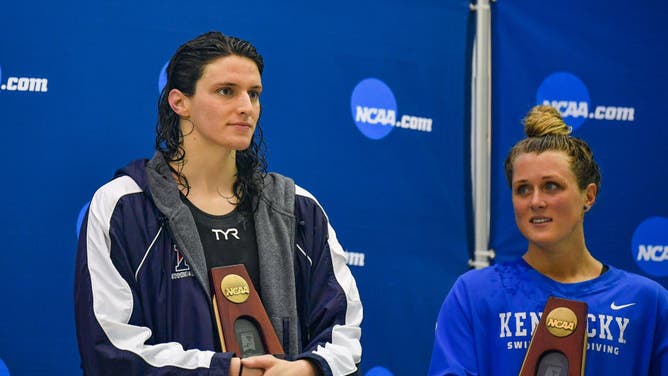University of Pennsylvania swimmer, and biological male, Lia Thomas and Kentucky swimmer Riley Gaines react after finishing tied for 5th in the 200 Freestyle finals at the women's 2022 NCAA Swimming and Diving Championships.
