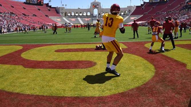 Quarterback Caleb Williams #13 of the USC Trojans warms for the 2022 USC Spring Football game at Los Angeles Memorial Coliseum